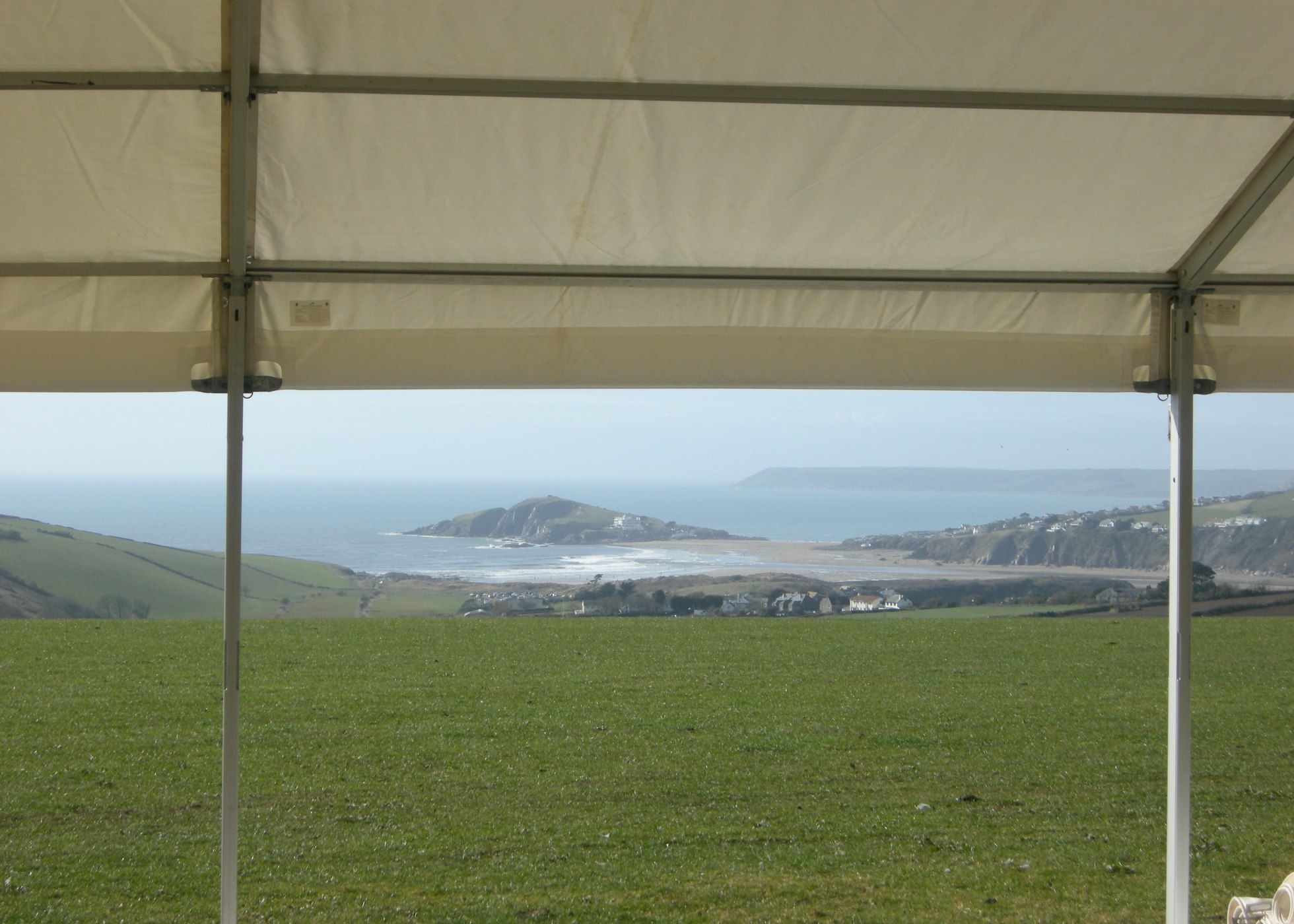 View of Burgh Island from marquee at Bantham Bash wedding site, Thurlestone, Devon