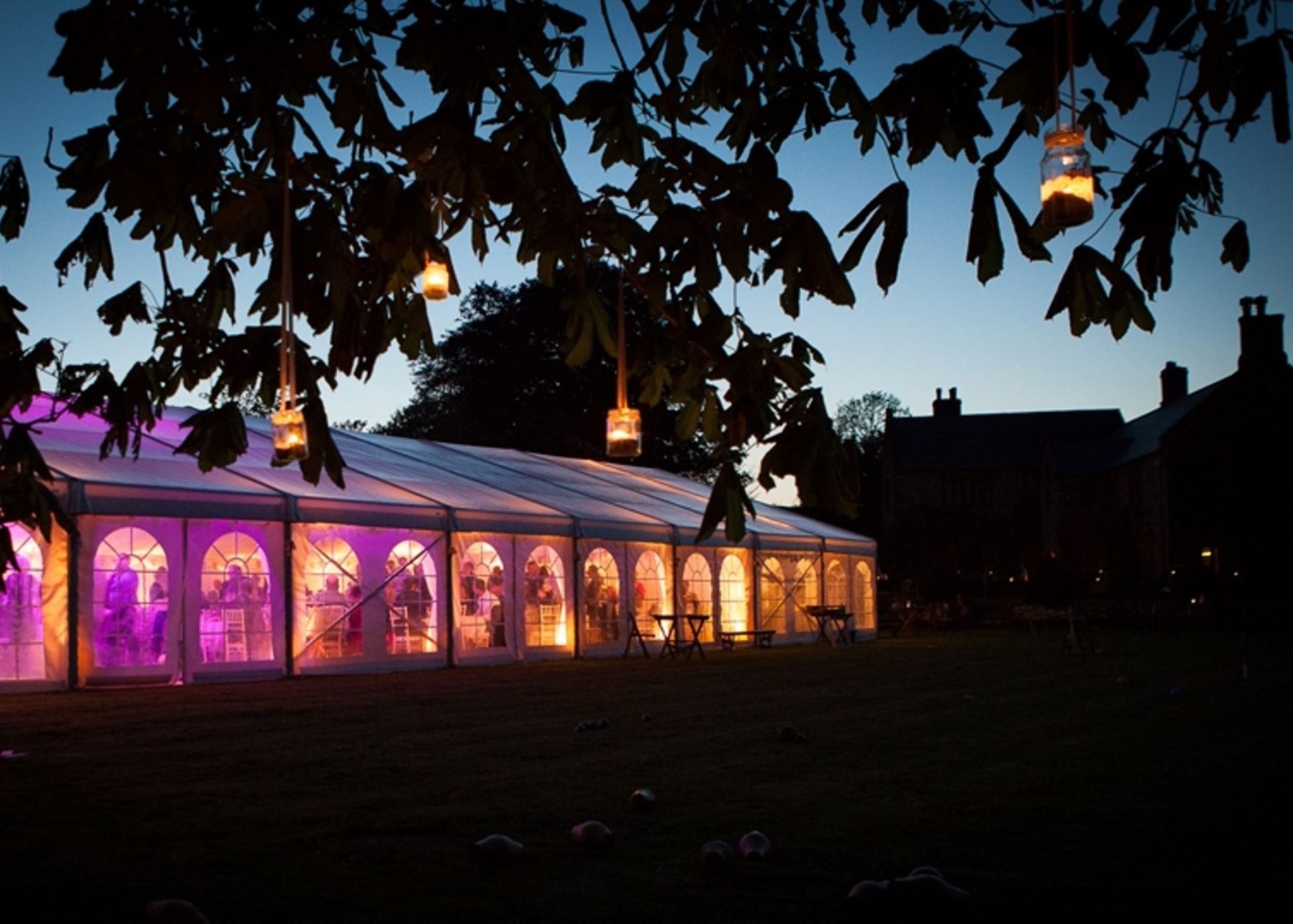 Exterior view of Wedding Marquee at Sheafhayne Manor in East Devon lit at night