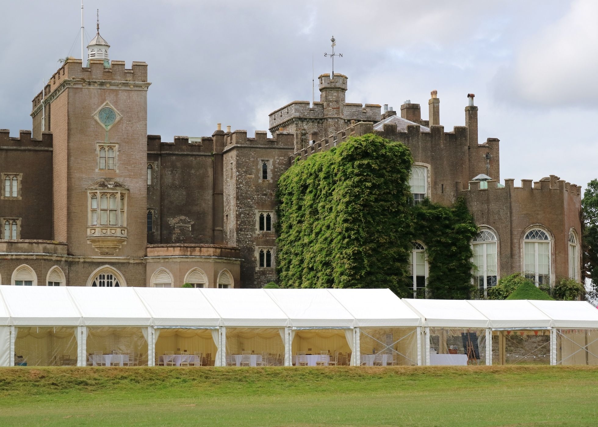 exterior view of marquee with Powderham Castle in the background